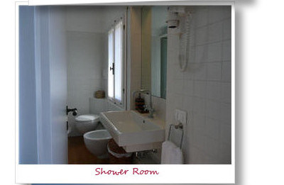 Bathroom with shower, bidet, loo and wash-hand basin